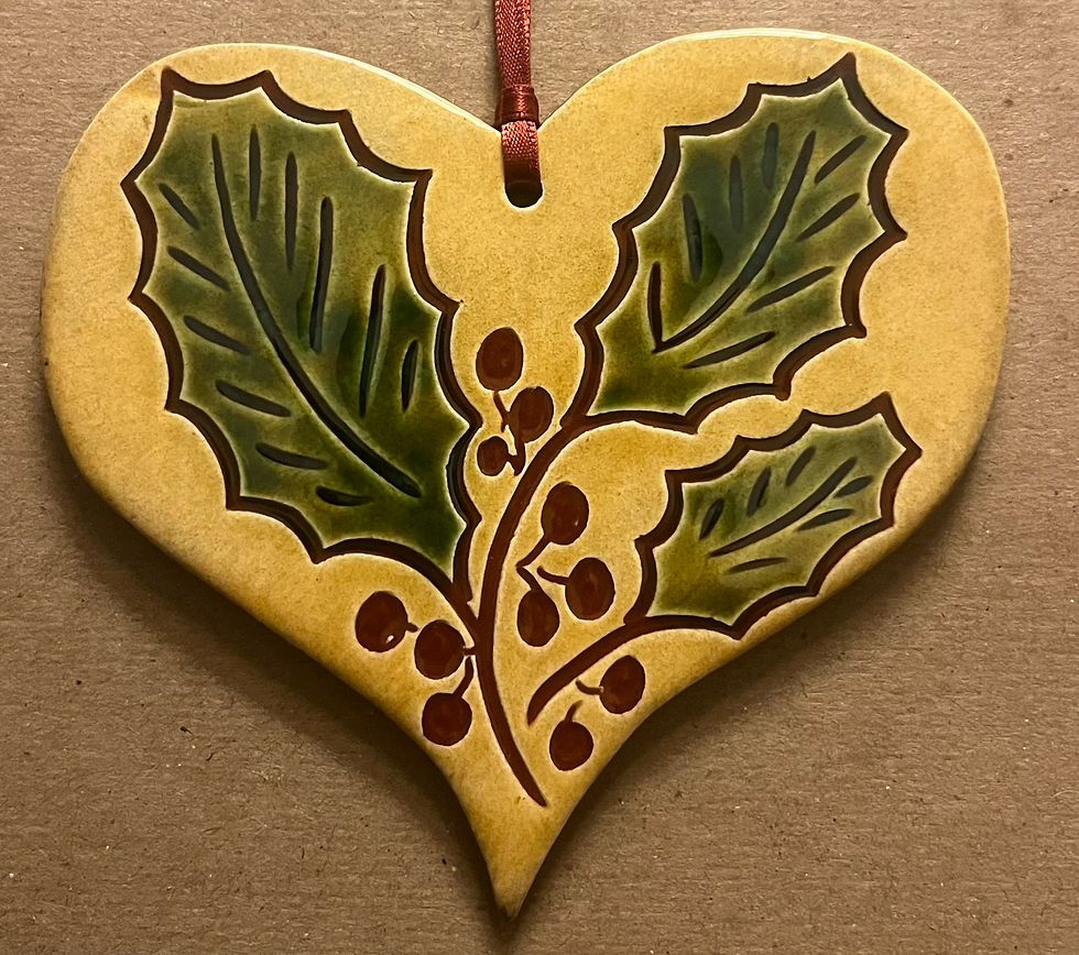 sgraffito heart made by Denise Wilz in the traditions of the Pennsylvania German Redware potters