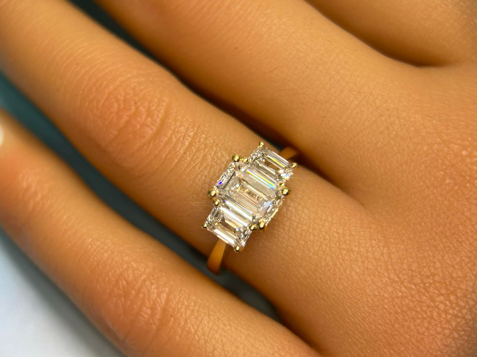 Thumbnail: Emerald Cut 3 Stone Diamond Ring