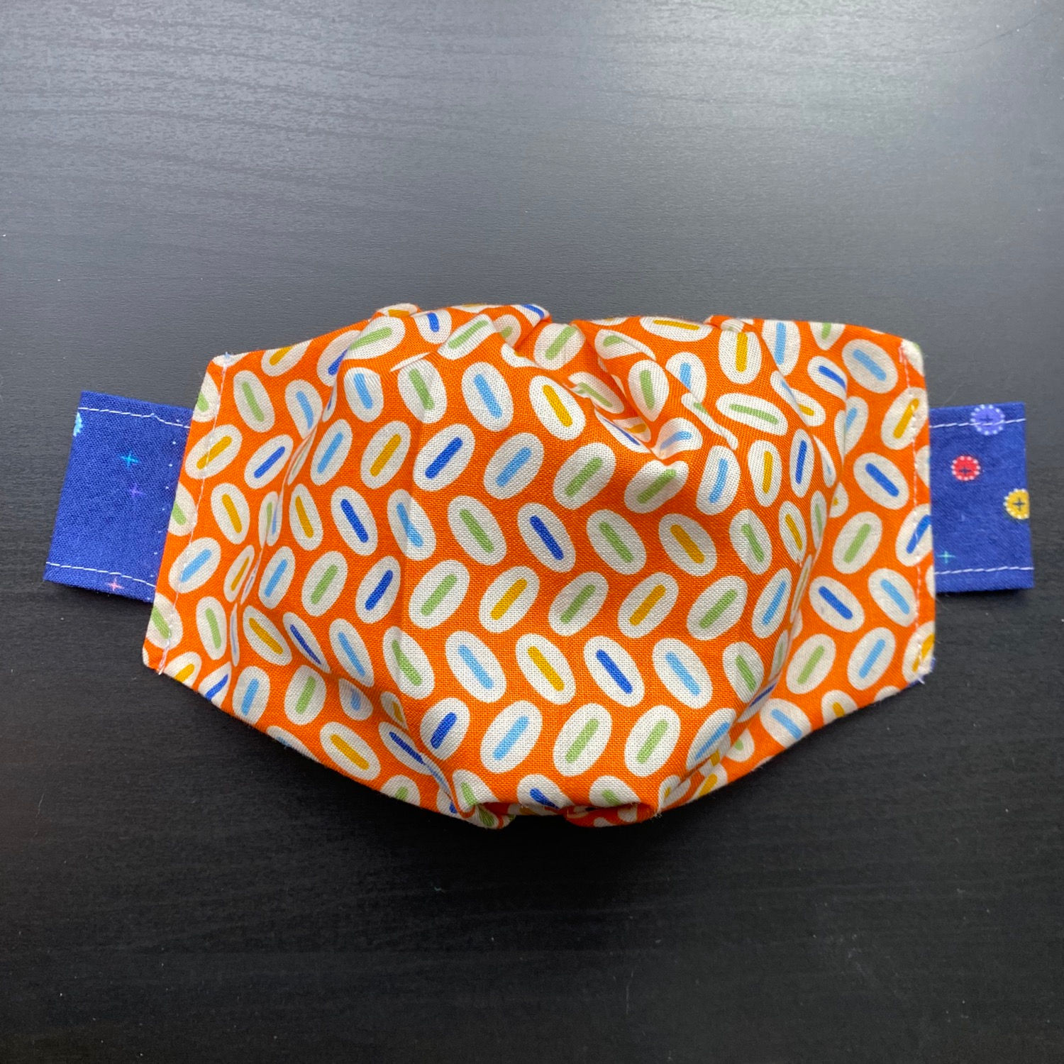 NEW Reversible/Breathable Mask: Orange button/Cosmic dots