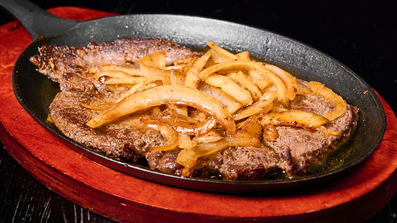 Steak w/ Onions - Bistec Encebollado