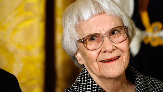 Woman (harper Lee) with white hair and sunglasses
