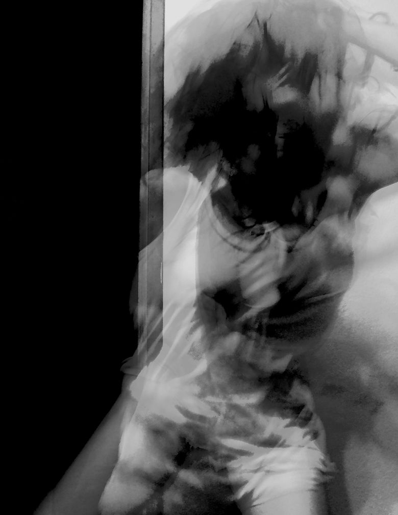 a blurred woman's silouette wearing white