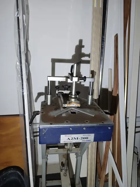 A2M-200 framing underpinner machine in a workshop