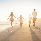 Family Walking On the Beach