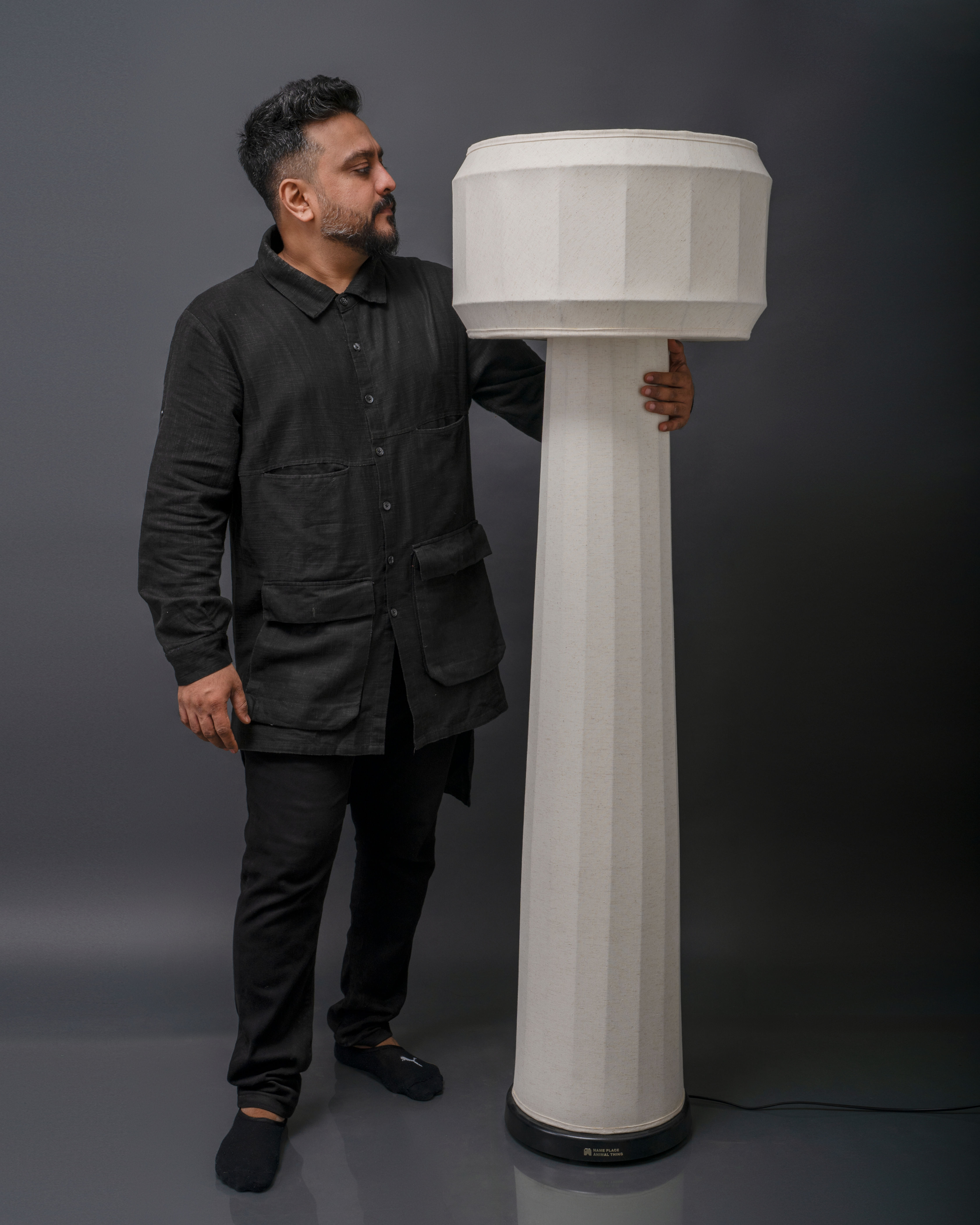 The DOMUS standing lamp and corner lamp designed by Priyam Doshi, adding character to a modern space.