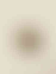 BUD ceramic clay LED wall light styled in a minimalist bedroom, adding warmth and contemporary elegance.