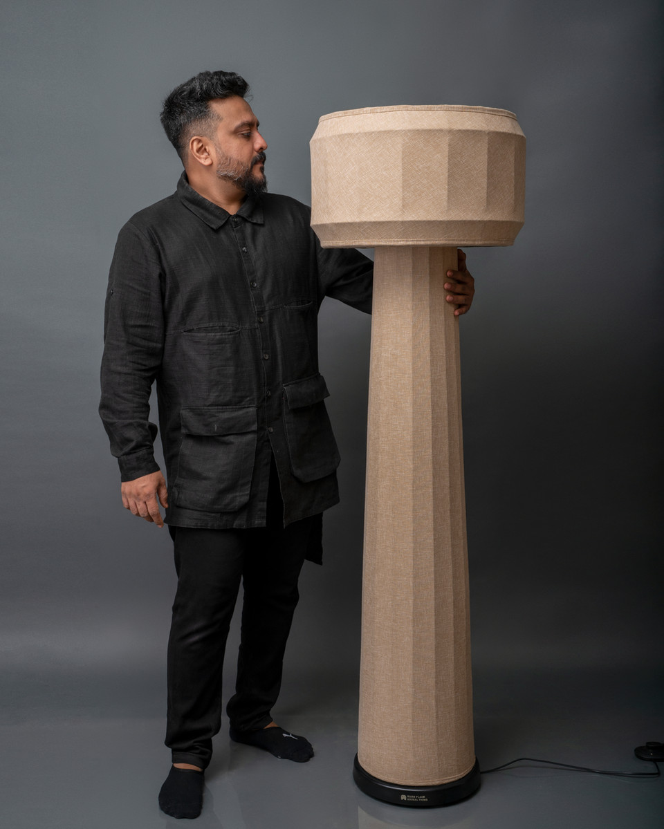The DOMUS standing lamp and corner lamp designed by Priyam Doshi, adding character to a modern space.