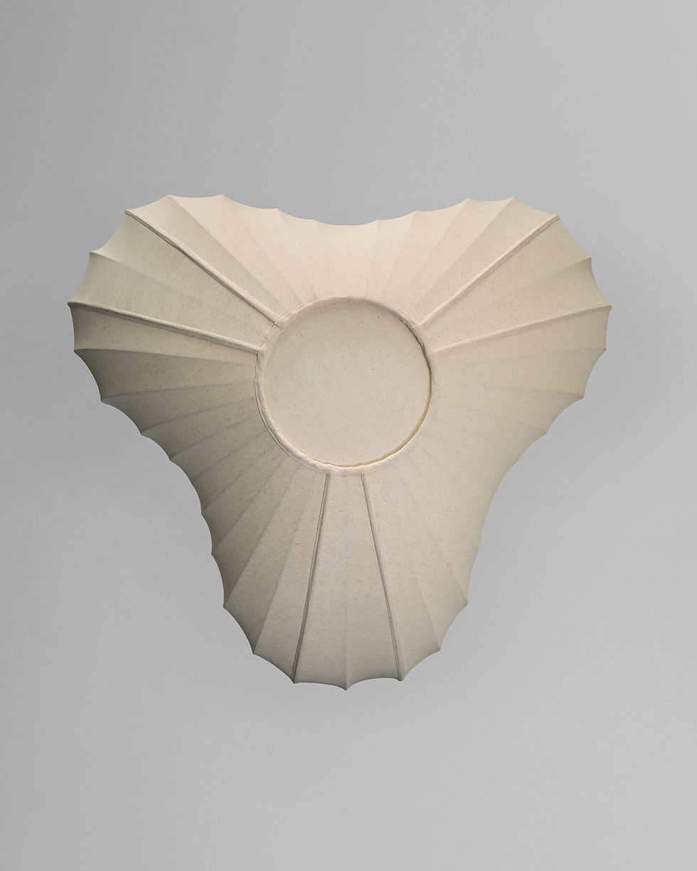 Thumbnail: Low-angle view of the unlit minimal TRIA flush mount, showcasing its ivory fabric form perfect for Japandi interiors.