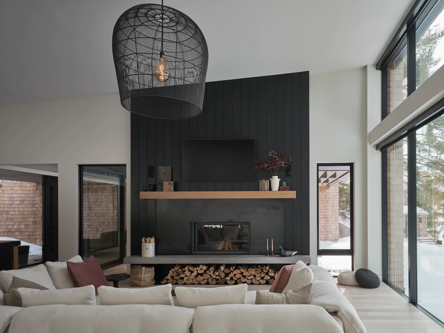 Sunnybrook sanctuary custom home interior living room with fireplace and large window wall