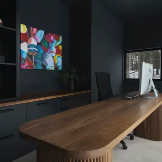 Sunnybrook sanctuary custom home interior office with wood desk and black built in cabinets, overlooking the water