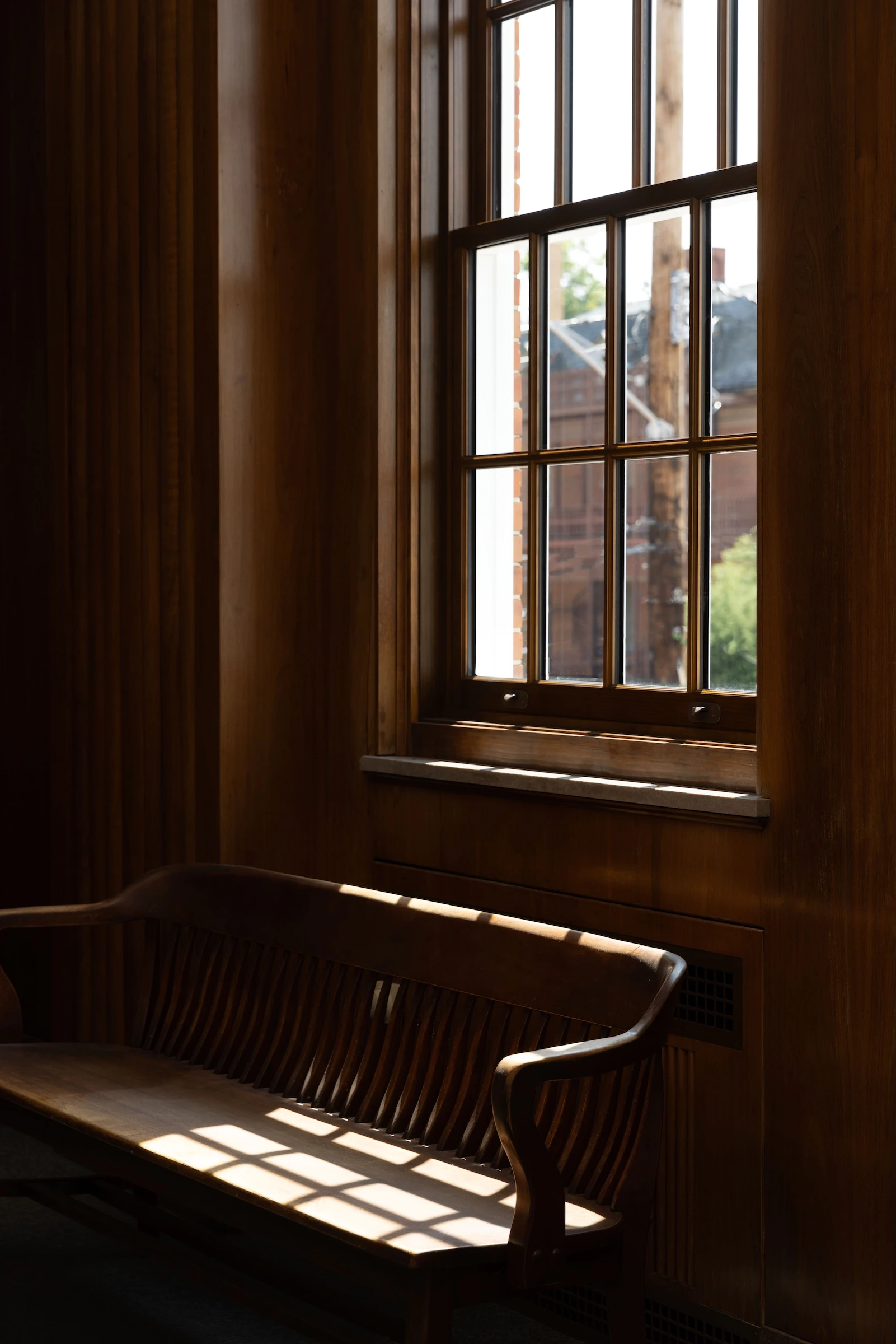 Stained wood interior of Marvin Ultimate heritage window replacement with SDLs