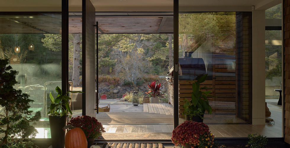 Sunnybrook sanctuary custom home exterior view of open entry door