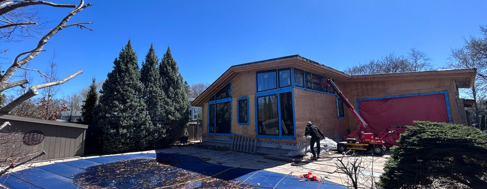 Wide rear elevation of Rideau Garden showing completed Marvin Ultimate window installation, sunny day
