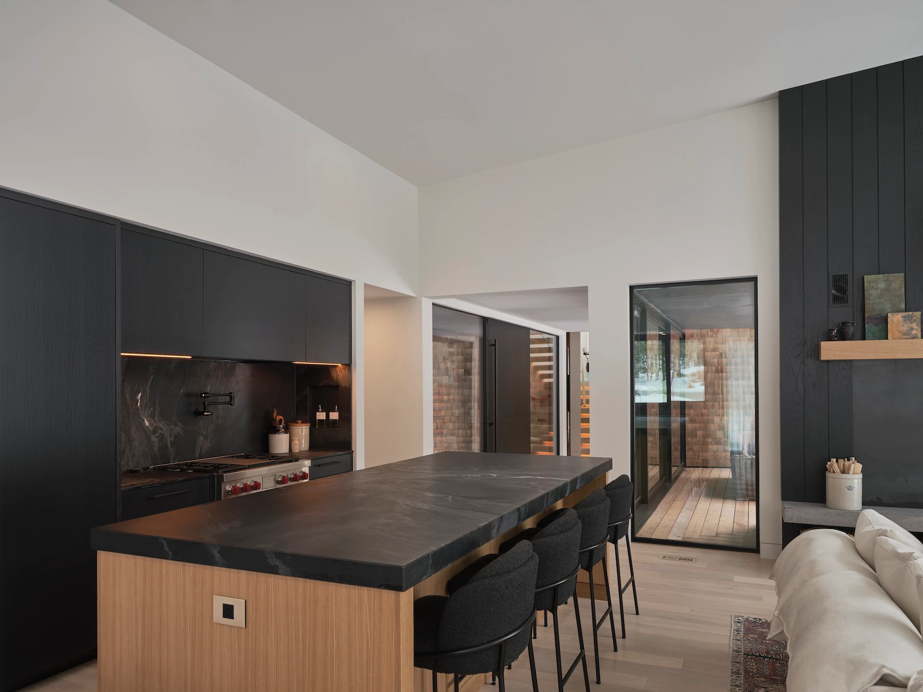 Sunnybrook sanctuary custom home interior kitchen island overlooking the patio