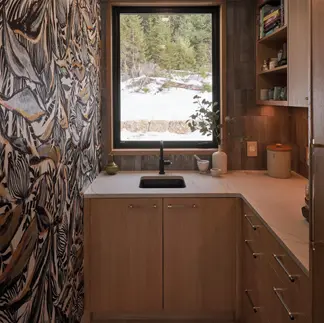 Sunnybrook sanctuary custom home interior laundry room with wallpaper