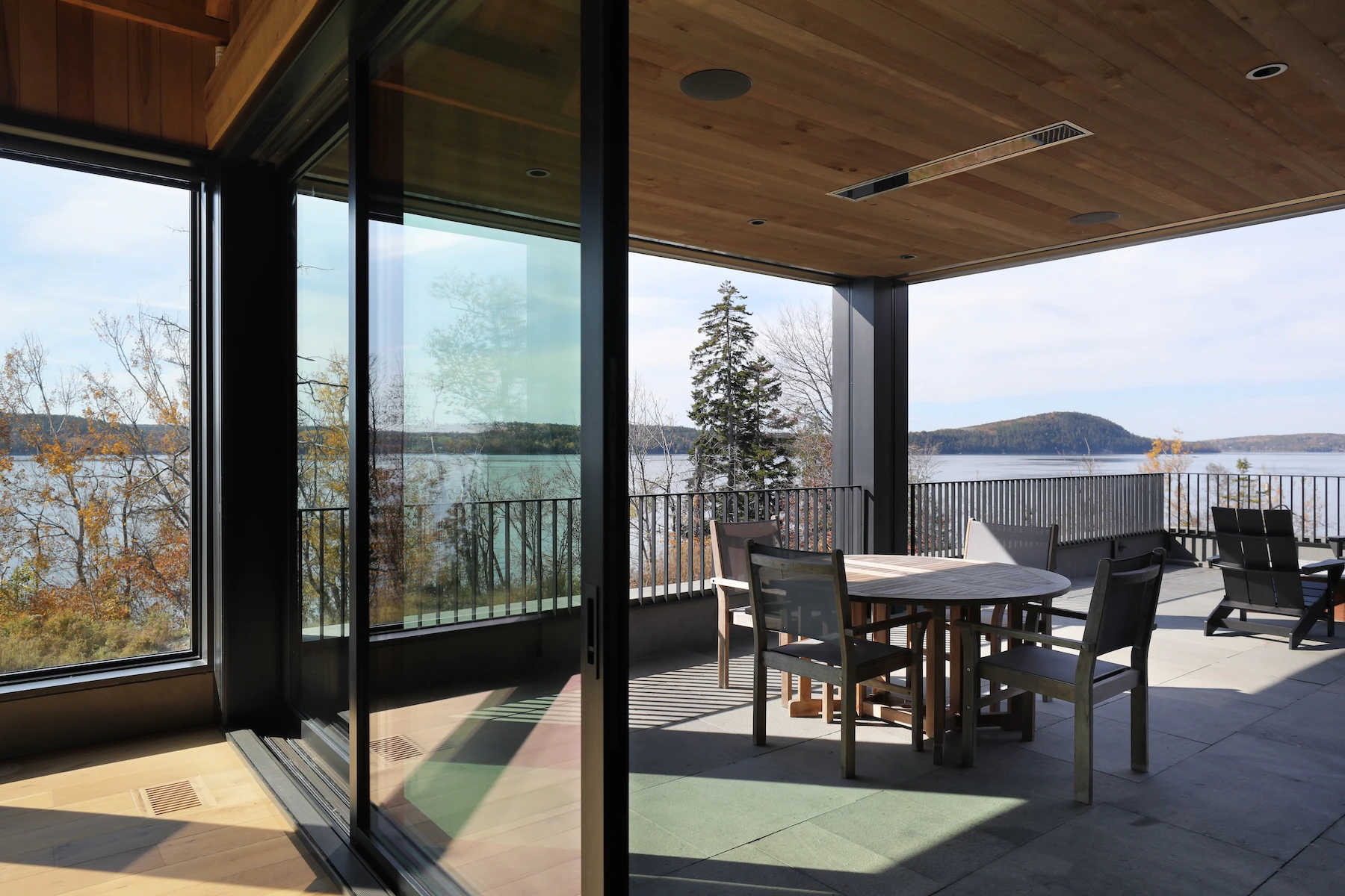 Sliding Marvin patio door that connects the dining room to a covered outdoor patio space