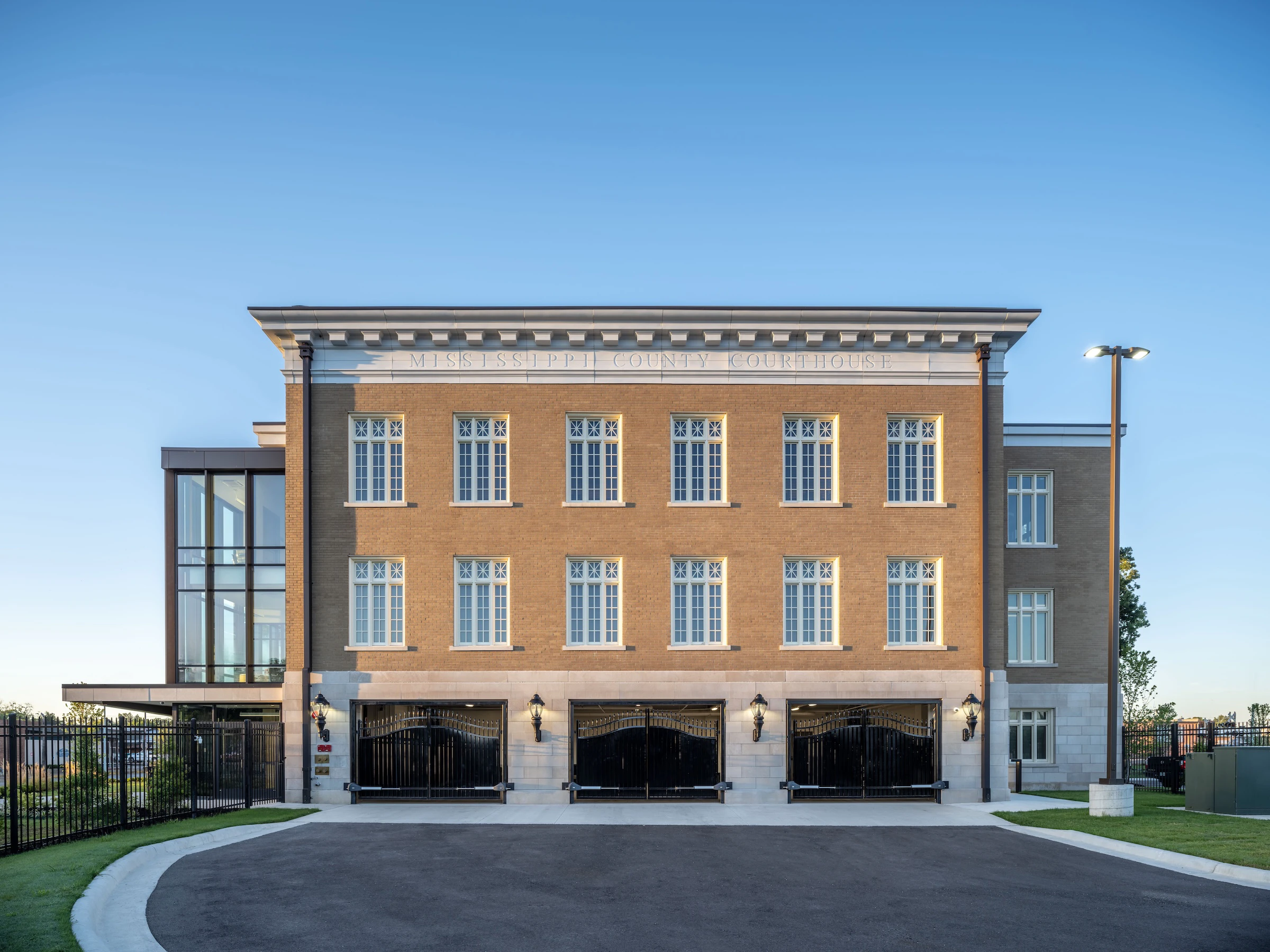 Heritage replacement windows at courthouse property with unique transom details