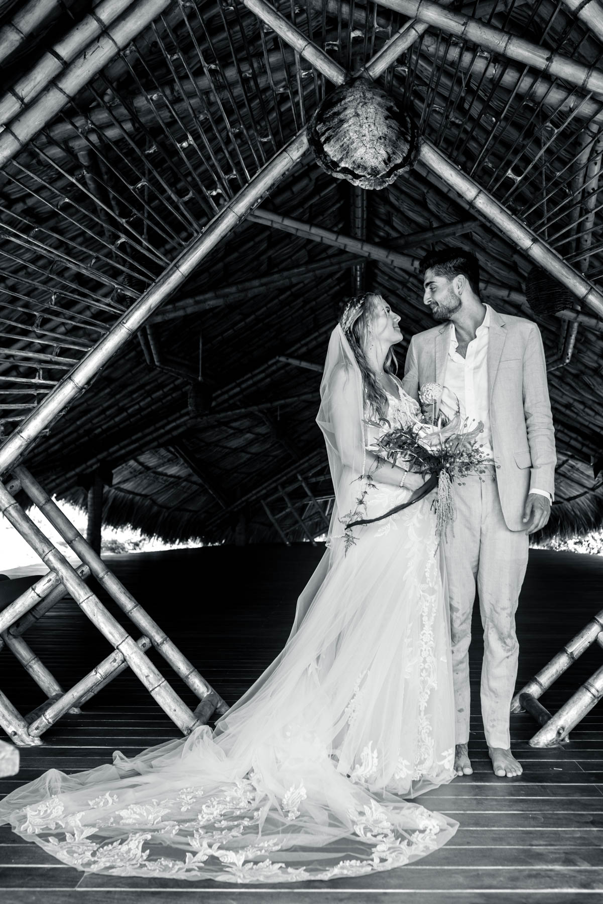 Luz Blanca Photographer capturing a candid beach wedding moment in Ixtapa Zihuatanejo