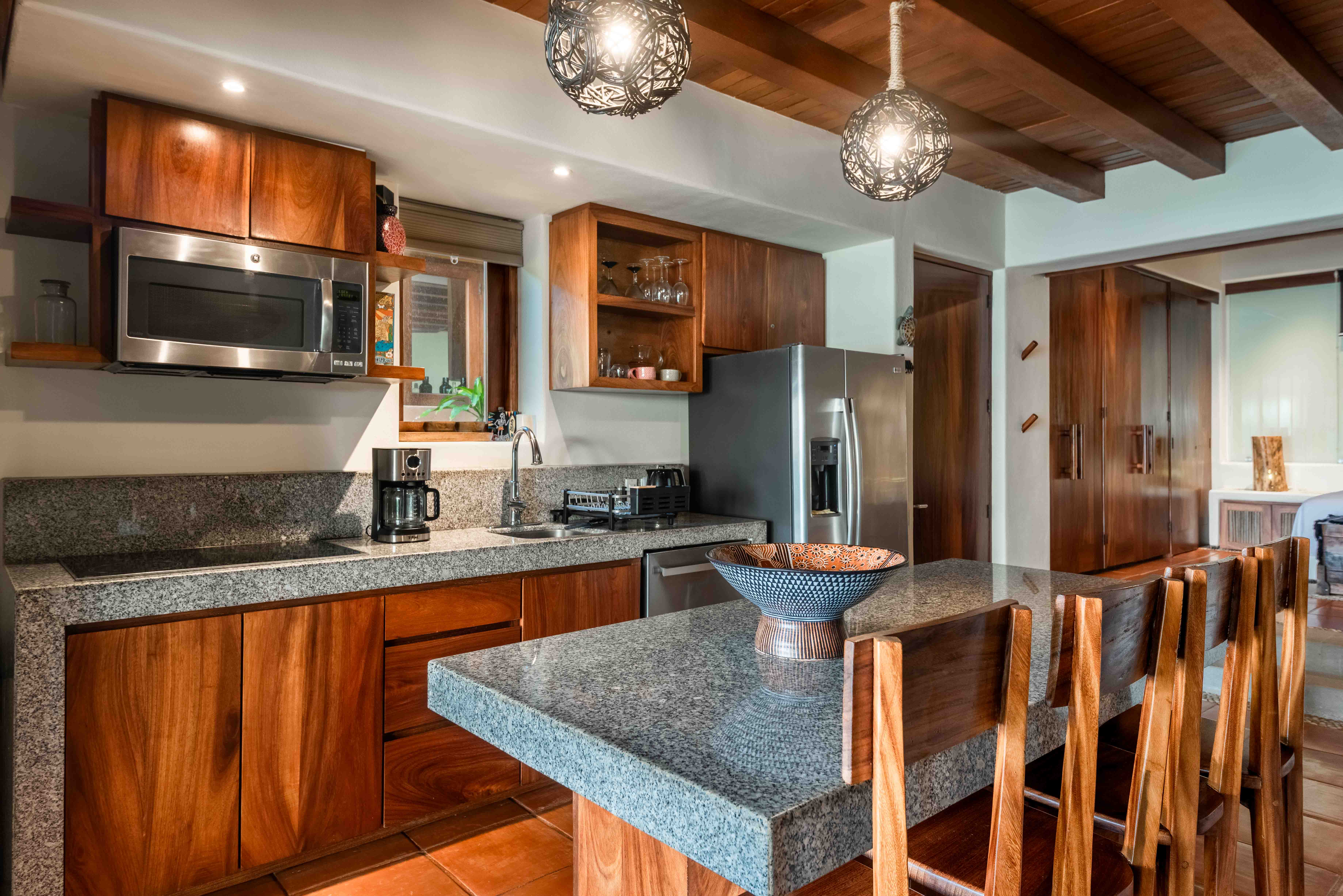 Modern kitchen interior with natural light in a contemporary Mexican residence