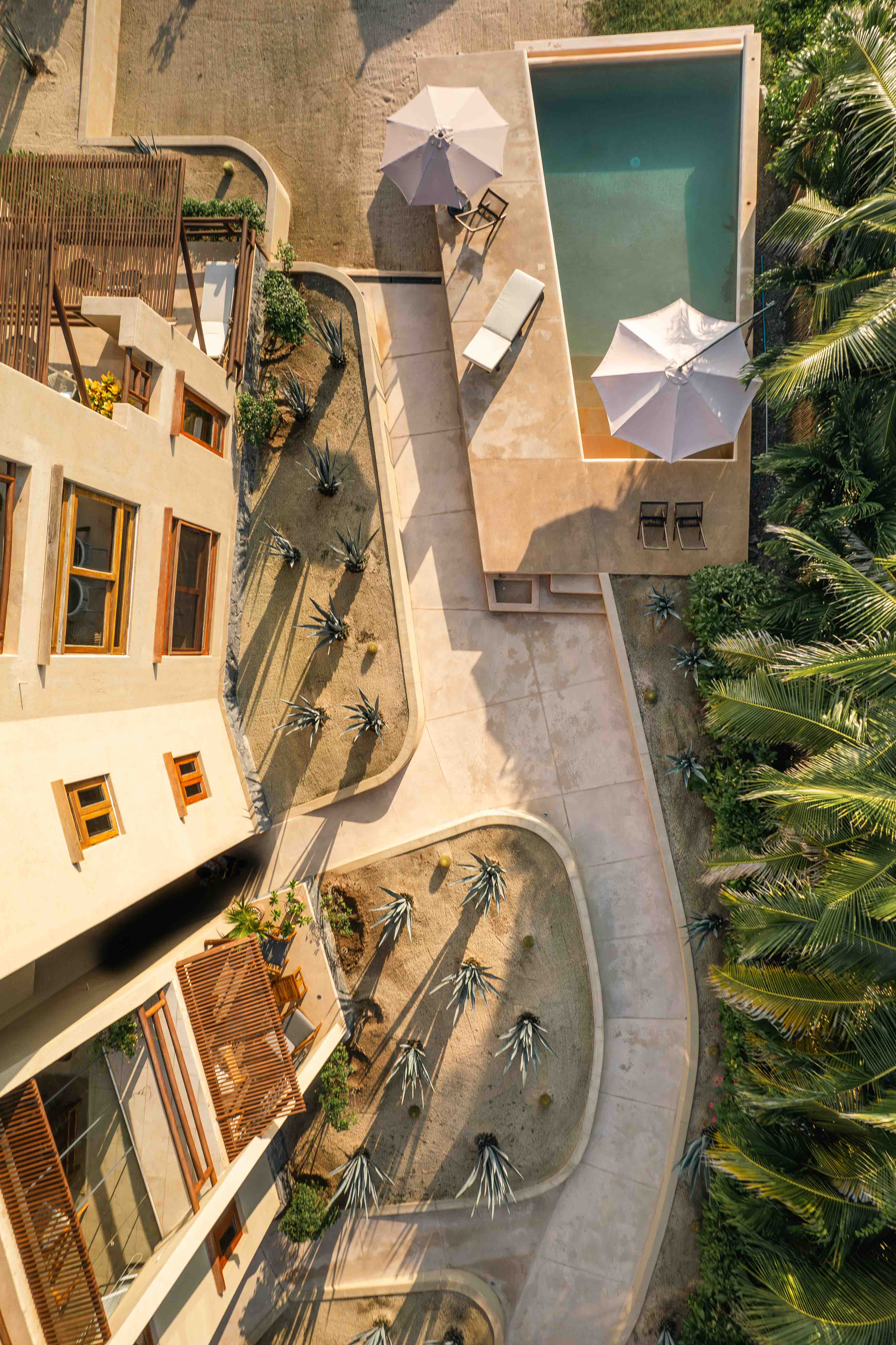 Bird's-eye view of the Nerea pool and building in Troncones, Mexico, designed by Zozaya Arquitectos