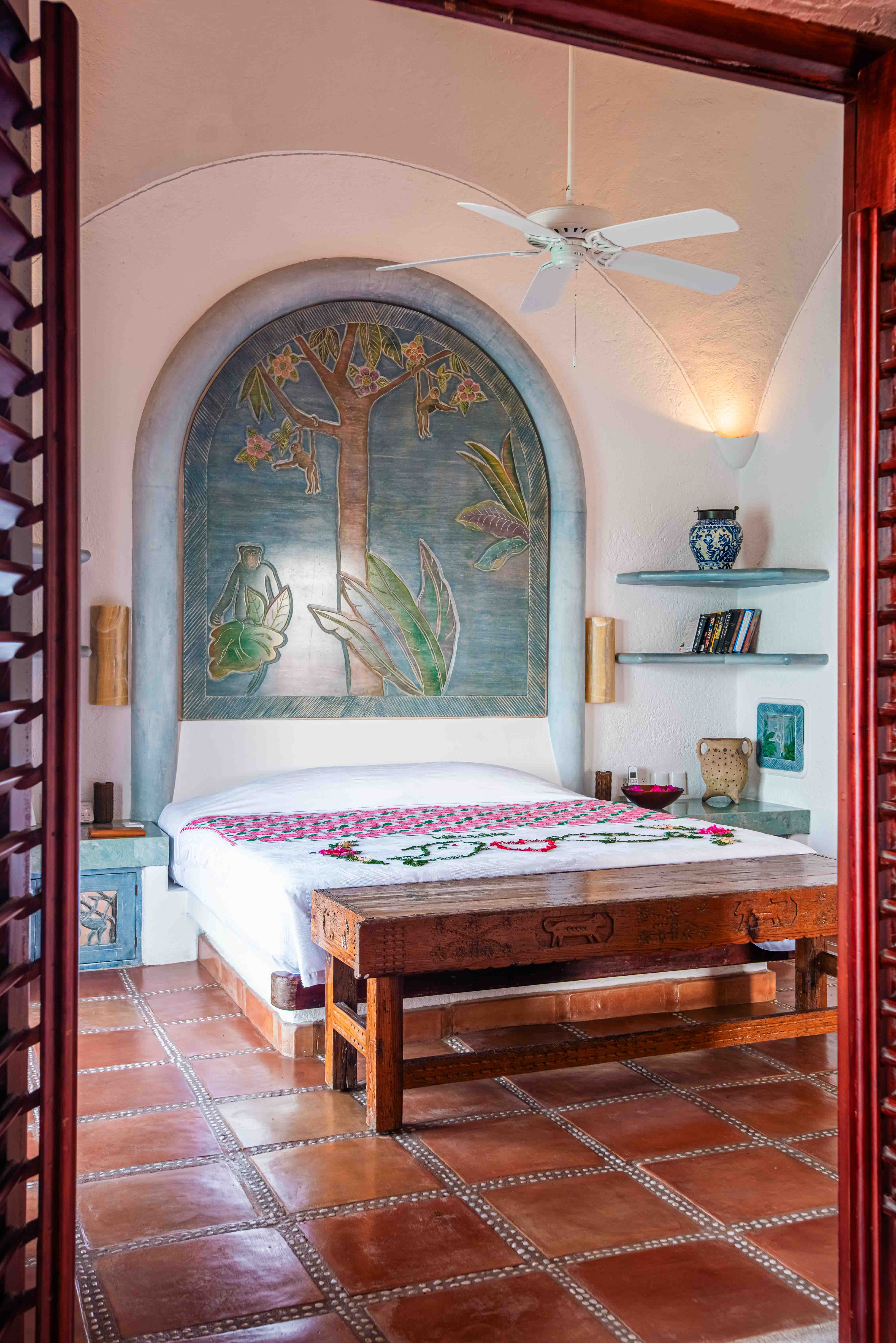 Guest room interior with ocean views at La Casa Que Canta in Zihuatanejo