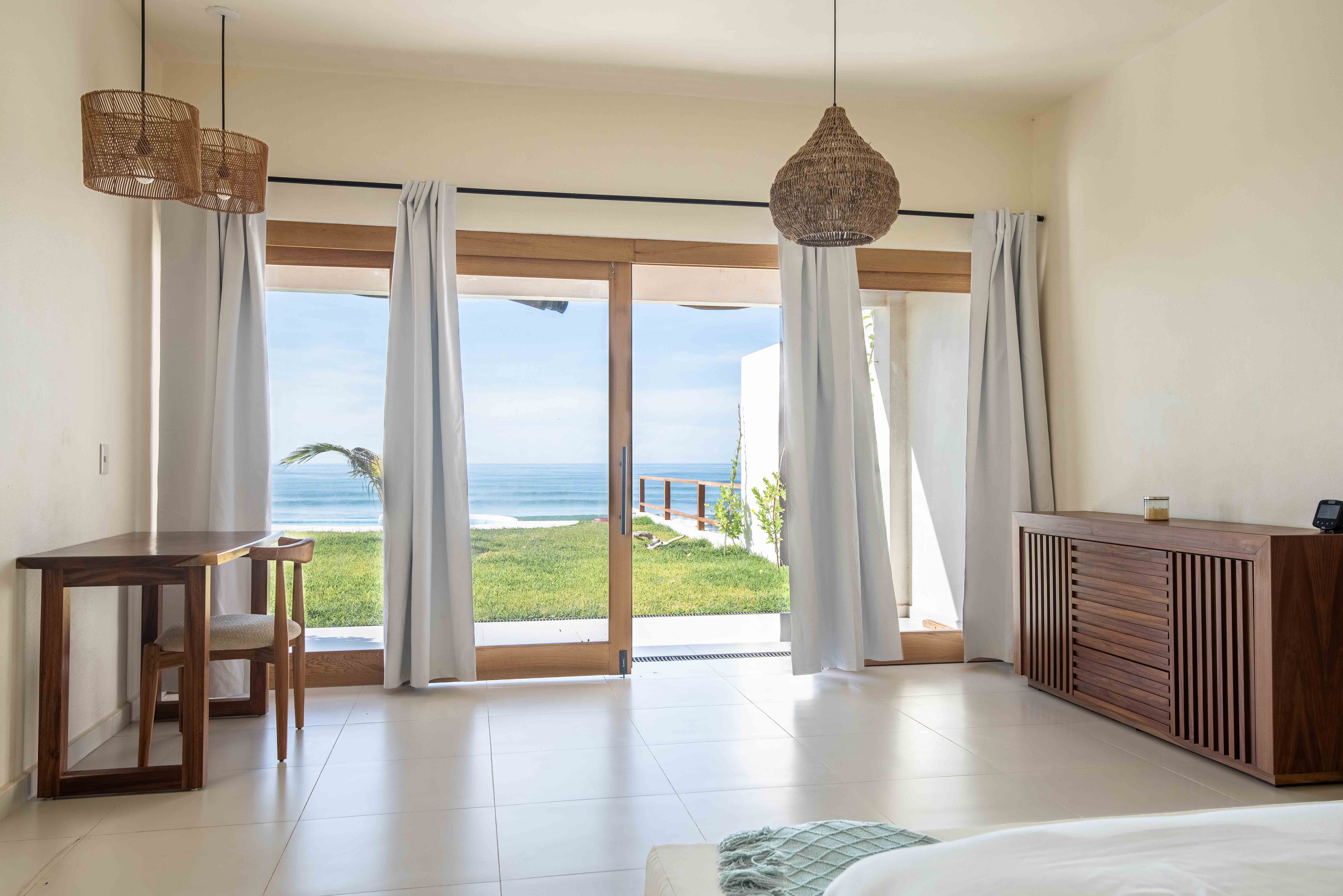 Bedroom with Pacific Ocean views in a luxury beachfront residence