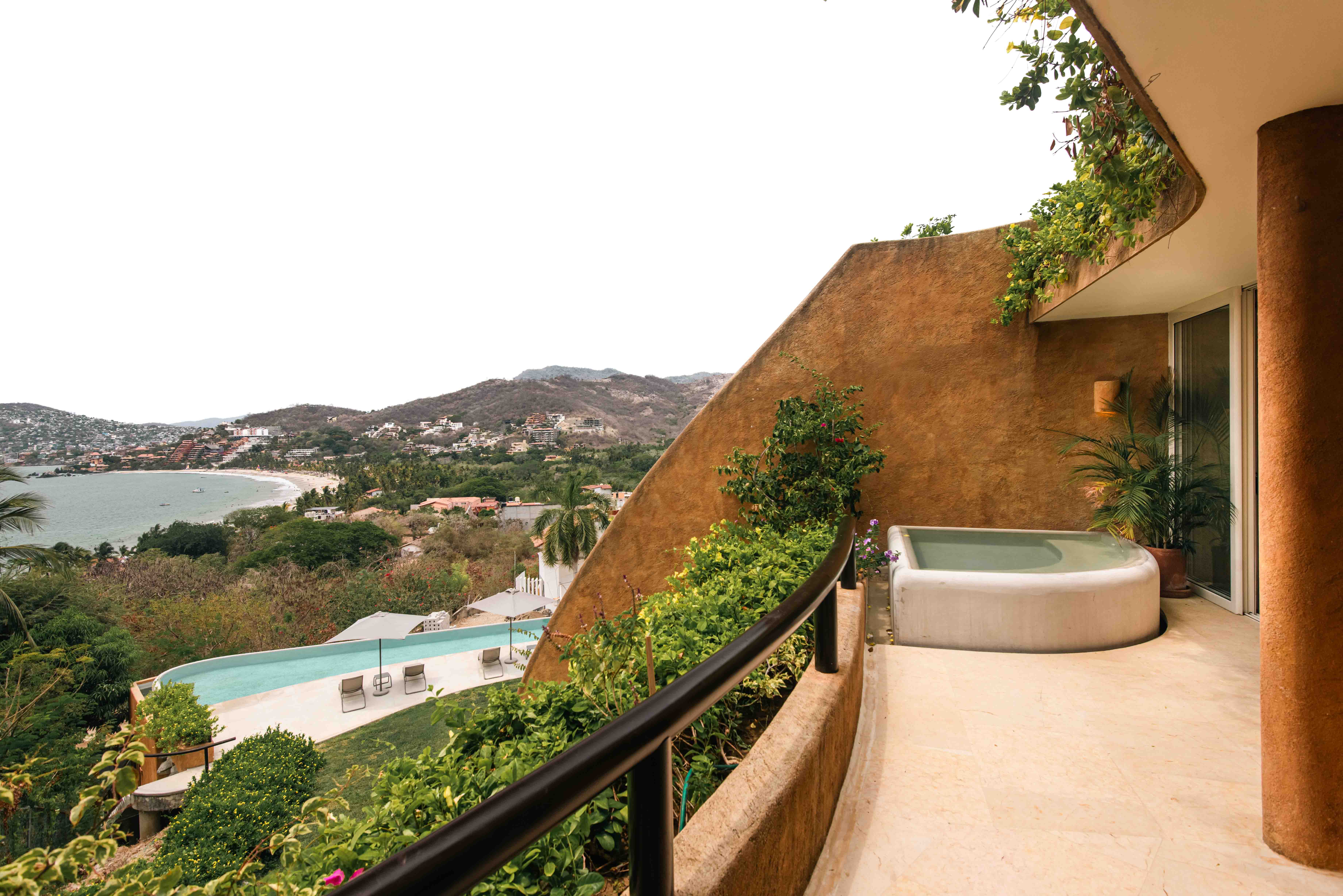 Outdoor terrace with ocean views at Armadillo residence in Zihuatanejo