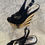 Thumbnail: Black and gold wedge woman shoe size 6