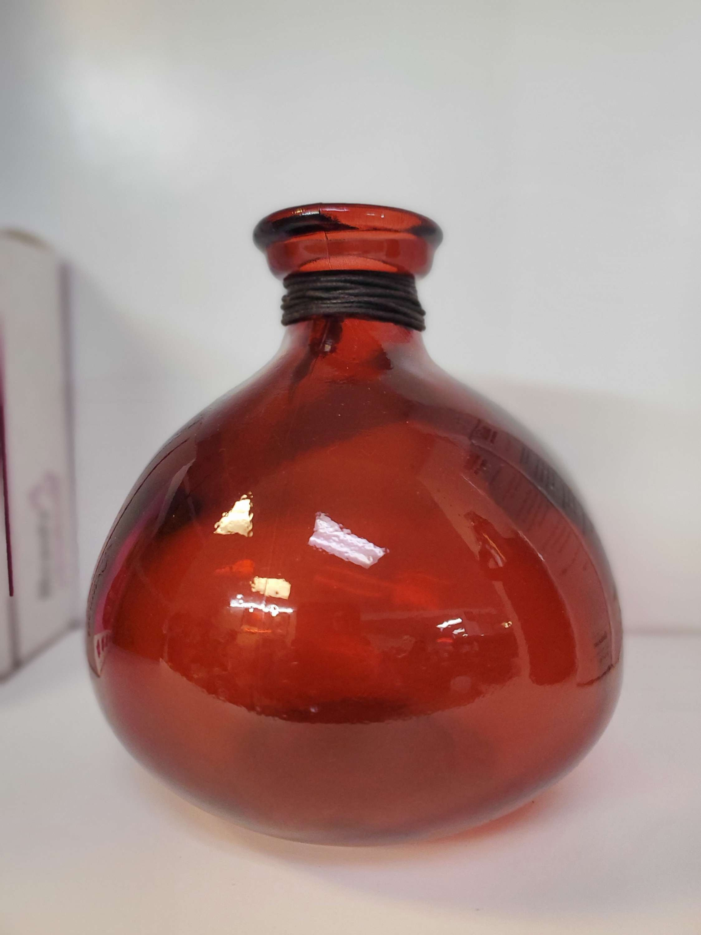 Red hand spun glass decorative vase 7in tall