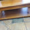 Thumbnail: Vintage strong wood center table on wheels. Great living room piece