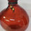 Thumbnail: Red hand spun glass decorative vase 7in tall