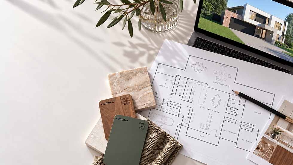 House floor plans, material samples and laptop displaying a modern home exterior.