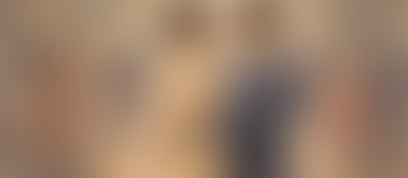 Neerav and Akash slow dance at Isha’s engagement celebration in Apulki Chapter 13 inside a decorated banquet hall.