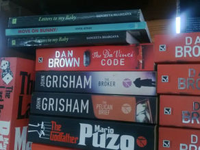 Copies of Letters to My Baby displayed among bestselling books at an A.H. Wheeler railway bookstall in India.