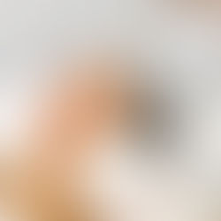 customer laying down with eyes closed and mixing of the mask