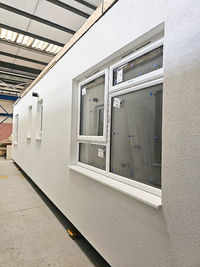 Rendered exterior of factory-built rooftop module with fitted windows