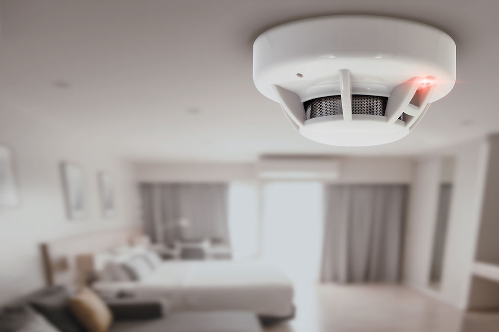 smoke detector fire alarm detector home safety device setup at home hotel room ceiling.jpg