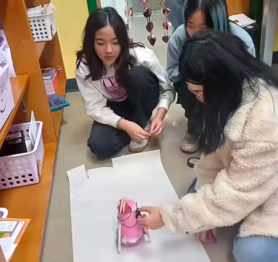 Students testing a scribble bot