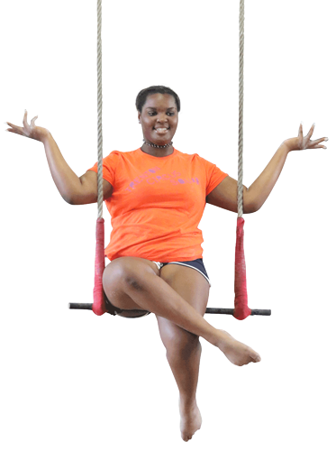 Aerialist Sitting on Swinging Trapeze