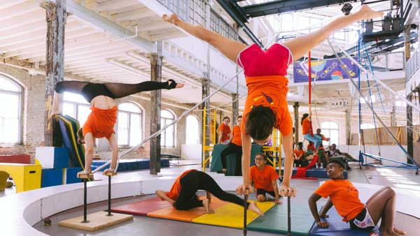 5 students working on balance