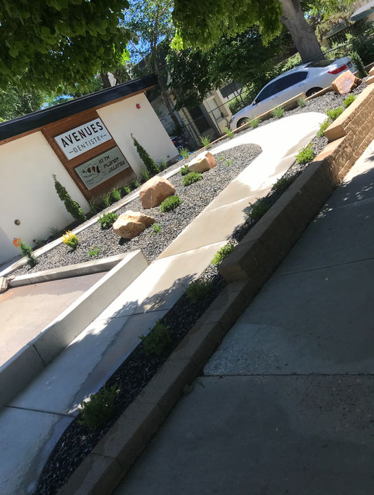 Concrete retaining wall and elevated landscape installation in Salt Lake County Utah
