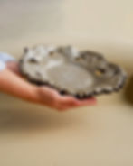 A richly crafted centerpiece featuring a stunning pattern of decorative holes.