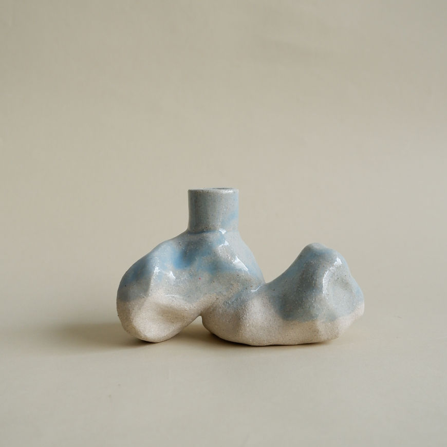 Complementary stoneware candle holders from 'The Gems' collection.