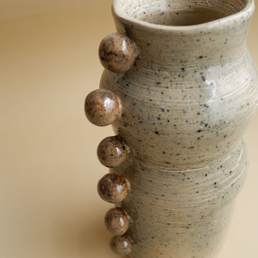 Handcrafted ceramic vase with clay bubbles, part of the Bubbles collection.