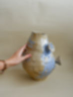 From "The Floral" collection, this piece is lovingly built by hand with beige stoneware.