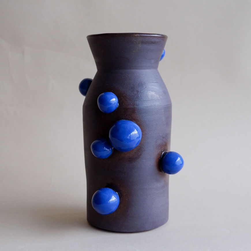 blue porcelain and dark stoneware