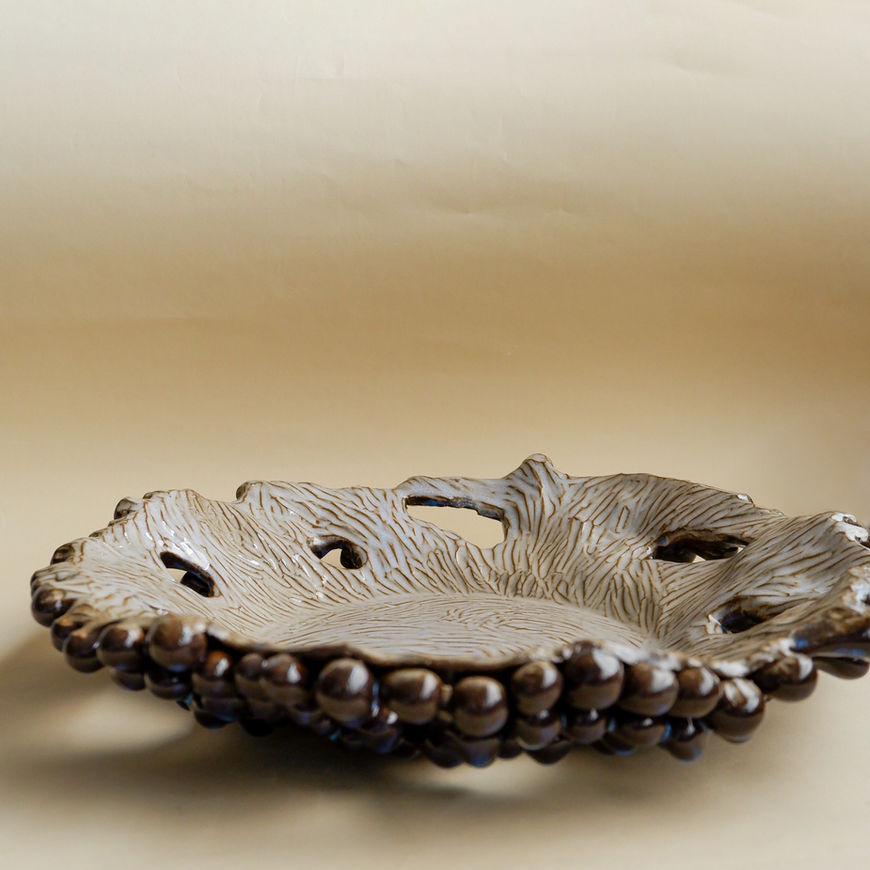Unique and elegant centerpiece, showcasing detailed perforations for a modern twist.