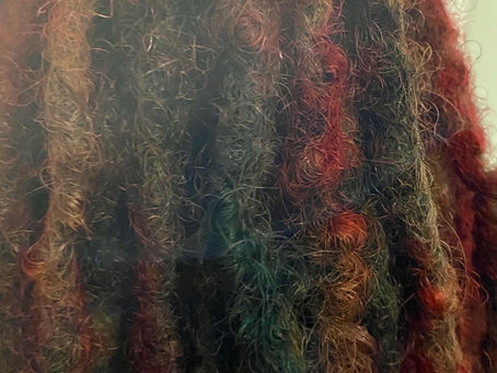 Hair Magnificence does Loc Retwist maintenance and Coloring