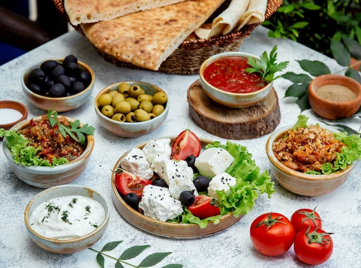 Collection of authentic Palestinian food products, including Za'atar, Sumac, Olive Oil, and Arabic Coffee, all sourced exclusively from Palestine.