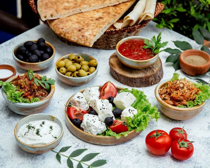 Collection of authentic Palestinian food products, including Za'atar, Sumac, Olive Oil, and Arabic Coffee, all sourced exclusively from Palestine.